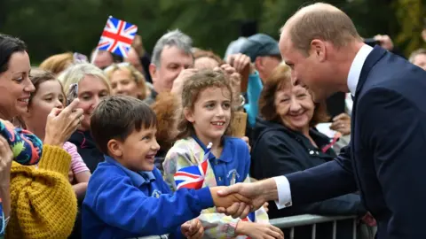 Getty Images Prince William meets crowds after unveiling Frank Foley statue