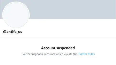 Twitter A suspended Twitter account with the handle @antifa_us is seen in this screenshot