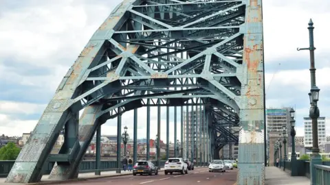 BBC Peeling and rusting paintwork on Tyne Bridge