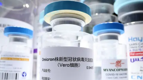 Getty Images Sinopharm vaccine vials on display at Beijing trade fair