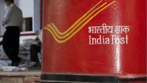 Getty Images Letter boxes in front of the main post office in the capital of Himachal Pradesh