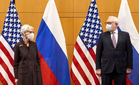 Reuters US Deputy Secretary of State Wendy Sherman (L) and Russian deputy Foreign Minister Sergei Ryabkov (R) pose for pictures as they attend security talks on soaring tensions over Ukraine, at the US permanent Mission, in Geneva, on January 10, 2022