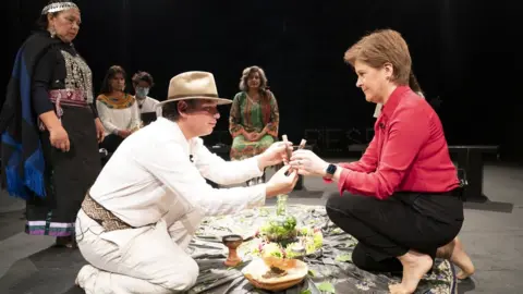 PA Media Calfin Lafkenche and Nicola Sturgeon