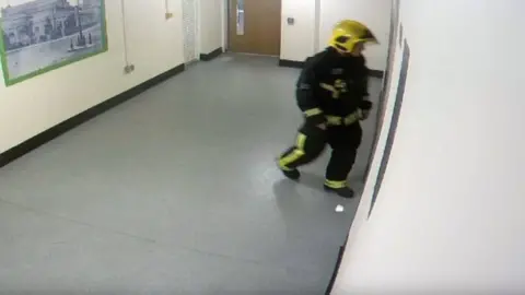 PA a CCTV image of David Badillo entering a lift in Grenfell Tower on the night of the fire as he attempted to reach Jessica Urbano Ramirez