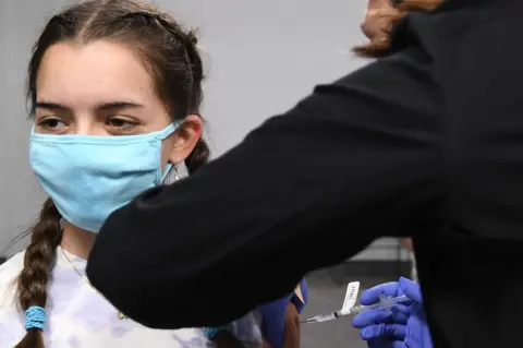 Getty Images Younger teenagers in the US are being vaccinated