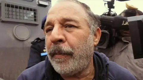 Piran Ditta Khan outside court