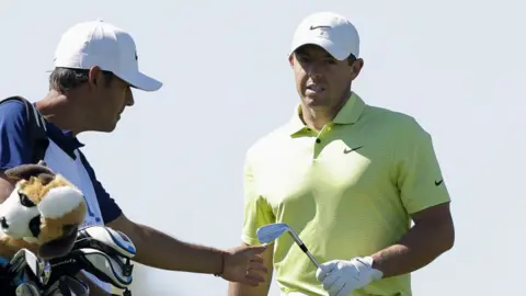 Rory McIlroy (right)