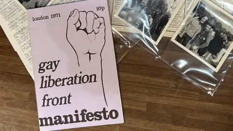 BBC news The Gay liberation Front Manifesto rests on a stack of old pictures