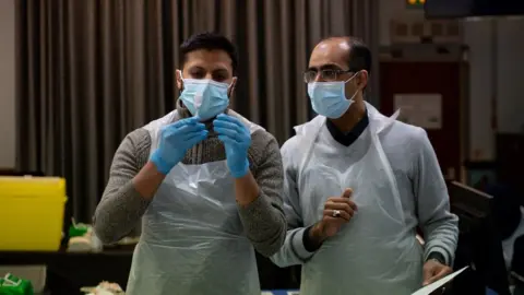 PA Media Doctors in the mosque