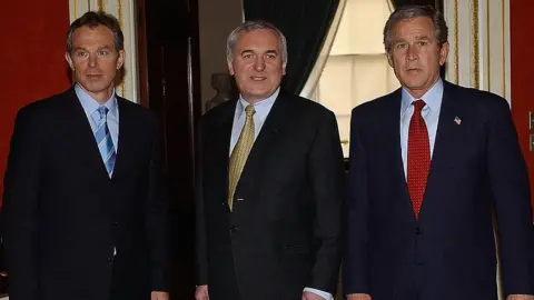 Getty Images Tony Blair, Bertie Ahern and George Bush in Hillsborough Castle, 2003.