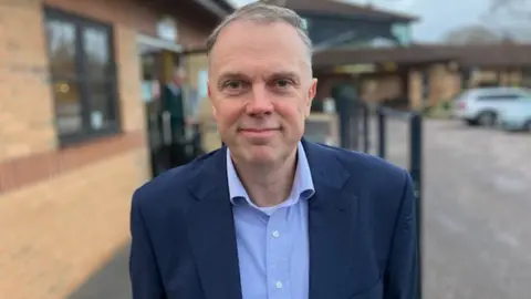 BBC David Slack Finance Director of St Margaret's Hospice, Somerset