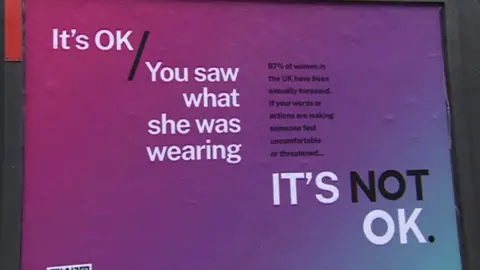 One of the billboards saying 'you saw what she was wearing', meaning it's not OK to victim blame