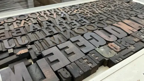 Shaun Whitmore/BBC letter blocks