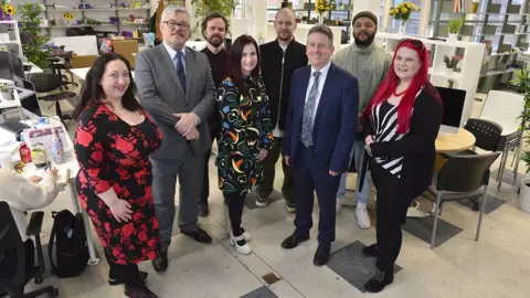 Excalibur Press From left: Christine Watson, Damien Corr, Tim Farrell, Julie Reid, Paul Kelly, Jim O’Hagan, Luke Godson and Tina Calder