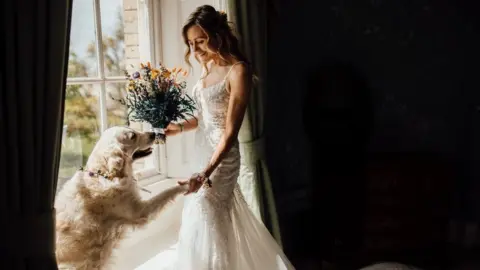 Suzy Cole Suzy with one of the dogs