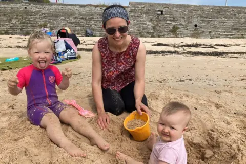 Jodie(mum), Reagan (left) and Yara enjoying a day at Scapa Beach