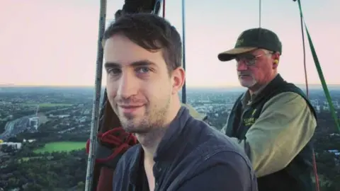 PETER HANCOCK Phillip Hancock in a hot air balloon