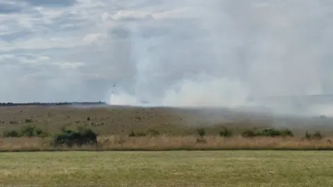 HQ Salisbury Plain Training Area﻿ Helicopter putting out fire