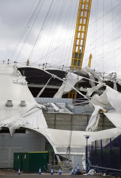 PA Media Damage to the roof of the O2 Arena in south east London, caused by Storm Eunice on 18 February 2022