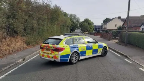 Essex Police A police care in London Road, Kelvedon, Essex