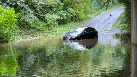 PA Media Flooding in Ashbourne, Derbyshire