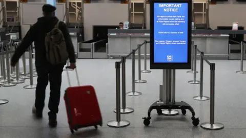 Andrew Matthews/PA Wire Southampton airport check-in