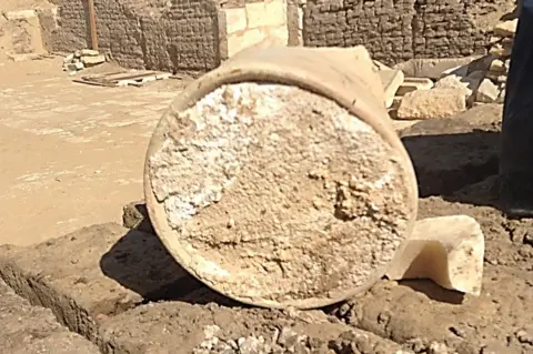 University of Catania and Cairo University A broken jar containing a 3,200-year-old piece on cheese