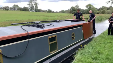 Leicestershire Police Police on Mr Tomlinson's boat