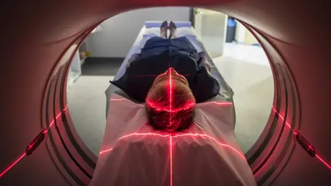 Getty Images Patient having a CT scan