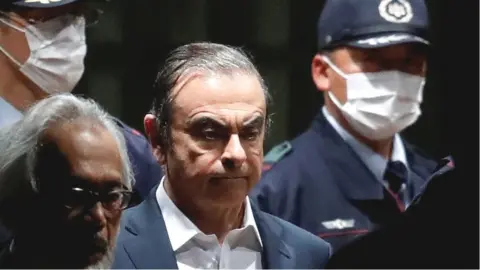 Reuters Carlos Ghosn leaving Tokyo Detention House on 25 April 2019