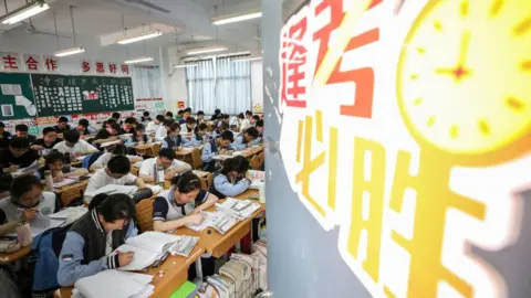 Getty Images Senior three students study in the classroom for the upcoming national college entrance exam