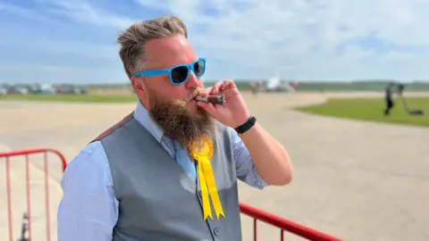 Jon Ironmonger/BBC Lib Dem Dan Lentell, Over & Willingham ward, South Cambridgeshire District Council celebrating his victory