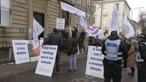 Hundreds join sexual health clinic counter protest