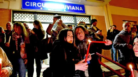 Alamy A candle-lit vigil was held on 6 March, the night after the 24 year old was allegedly attacked in the lift at the station