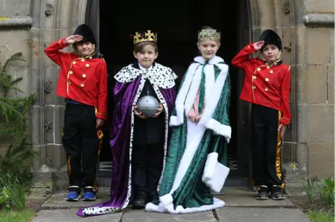 Peter Jolly Northpix Hamish Montgomery who was playing King Charles and Jessica Cook who was playing Queen Camilla in The Gordonstoun School version of the Coronation