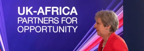 Reuters Mrs May leaving after addressing business leaders at the offices of First National Bank in Cape Town