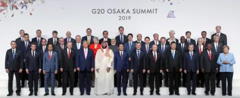 EPA The G20 family photo - with Saudi Arabia's Crown Prince Mohammed bin Salman central