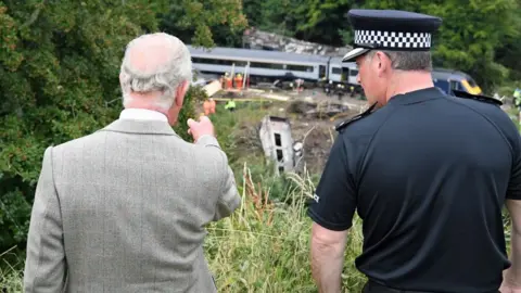 PA Media Prince Charles at the scene