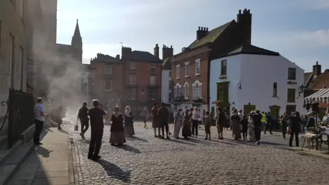 BBC/David McKenna Extras on set during filming of Peterloo