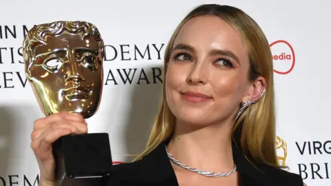 EPA Jodie Comer with her Bafta