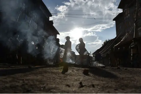 Getty Images Indian security forces during a protest in Srinagar