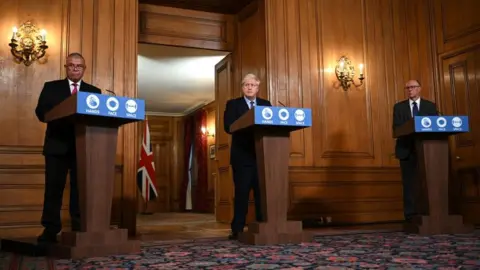 Getty Images Prof Jonathan Van-Tam with Prime Minister Boris Johnson and National Medical Director at NHS England Prof Stephen Powis