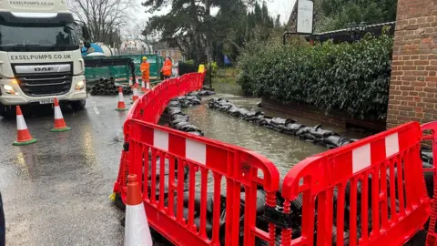 Tony Fisher/BBC barriers around flooding