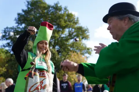 PA Media Competitors take part in the annual World Conker Championships