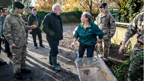 Getty Images Boris Johnson visits flood hit town