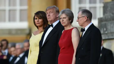 Getty Images Theresa May and her husband Philip May greet Donald Trump, First Lady Melania Trump at Blenheim Palace