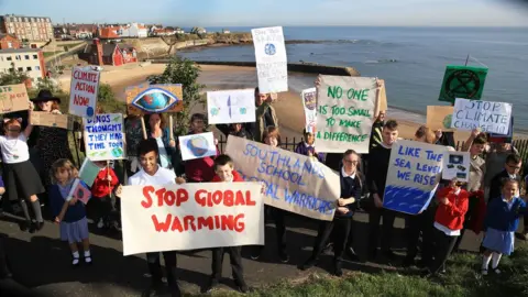 PA Media Pupils protesting in Cullercoats