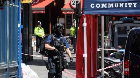 Getty Images Armed police officer