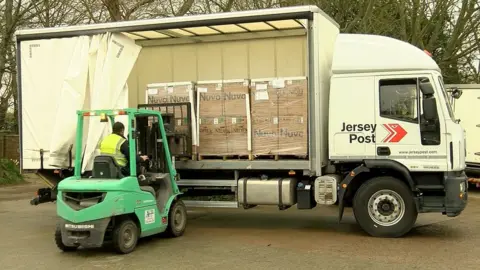 BBC truck being loaded with equipment