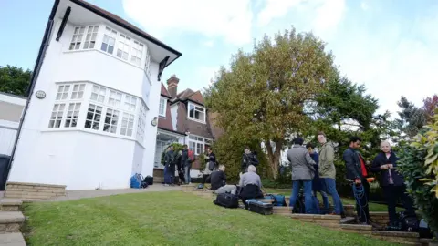 PA TV crews and reporters flocked to Ishiguro's London home